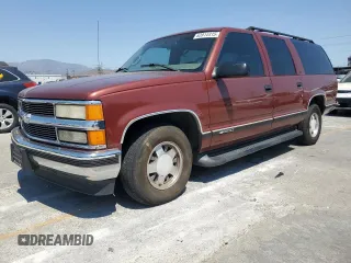 1999 Chevrolet Suburban with VIN 3GNEC16R2XG121506, listed as a Copart auction lot 63914415 with 211,042 mi miles and Salvage title. Bid and sale history available at DreamBid. Image 1.