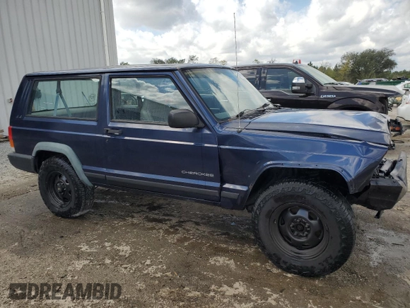 1997 Jeep Cherokee SE with VIN 1J4FT27P0VL612859, listed as a Copart auction lot 49869915 with 198,702 mi miles and Salvage title. Bid and sale history available at DreamBid. Image 4.