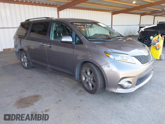 2015 Toyota Sienna SE with VIN 5TDXK3DC1FS667924, listed as a IAAI auction lot 42062805 with 123,504 mi miles. Bid and sale history available at carsss.com. Image 1.