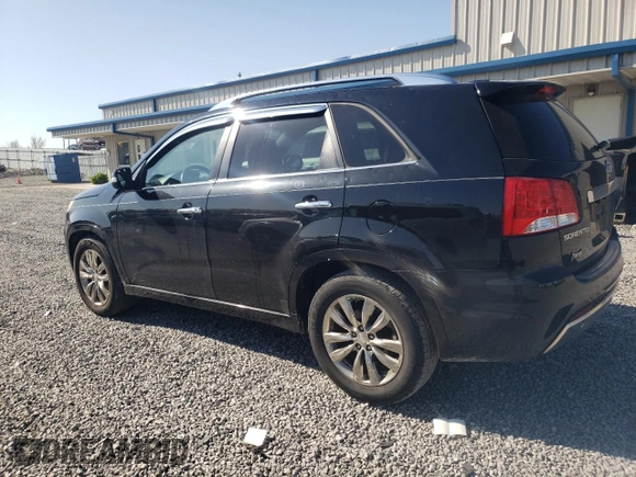 2012 Kia Sorento SX with VIN 5XYKW4A29CG247479, listed as a Copart auction lot 52226635 with 203,183 mi miles and Salvage Title. Bid and sale history available at carsss.com. Image 2.