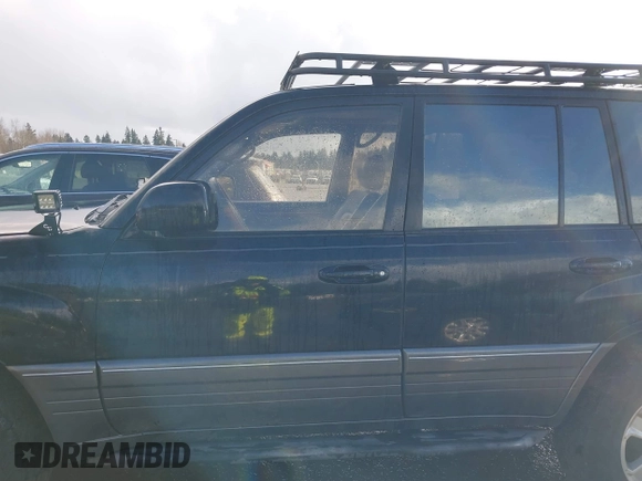 2001 Lexus LX 470 with VIN JTJHT00W613500563, listed as a IAAI auction lot 41730804 with 232,647 mi miles and . Bid and sale history available at carsss.com. Image 14.