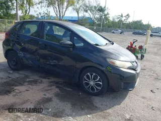 2016 Honda Fit LX with VIN JHMGK5H59GS002090, listed as a IAAI auction lot 41761887 with 97,577 mi miles. Bid and sale history available at carsss.com. Image 1.