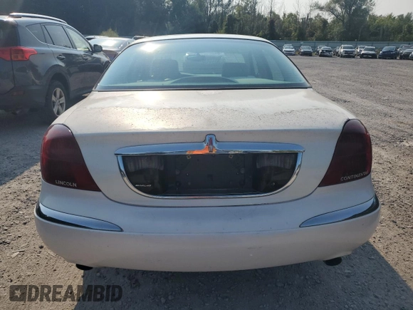 2001 Lincoln Continental with VIN 1LNHM97V91Y659769, listed as a Copart auction lot 71220804 with 0 mi miles and Salvage Title. Bid and sale history available at carsss.com. Image 6.