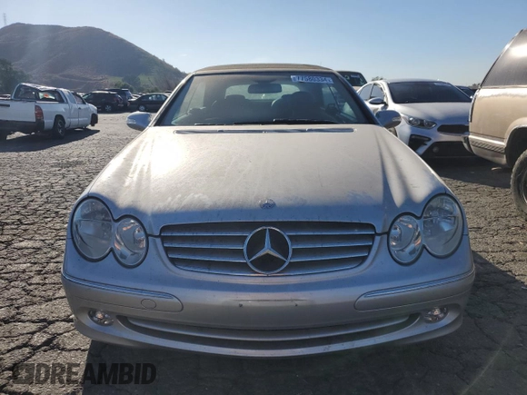 2005 Mercedes-Benz CLK-Class 3.2L with VIN WDBTK65J75F122191, listed as a Copart auction lot 77580334 with 51,439 mi miles and Salvage Title. Bid and sale history available at carsss.com. Image 5.