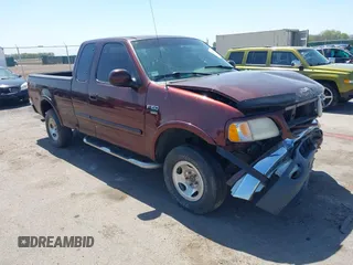 2000 Ford F-150 XL z VIN 1FTRX18L5YNA99713, wystawiony jako IAAI lot #42194838 z przebiegiem Nie podano mil oraz . Historia ofert i sprzedaży dostępna na DreamBid. Obrazek 1.