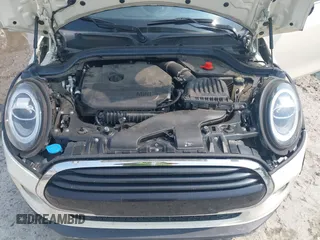 2020 MINI Hardtop 4 Door Cooper with VIN WMWXU7C01L2M54710, listed as a IAAI auction lot 42385956 with 55,714 mi miles and . Bid and sale history available at DreamBid. Image 10.