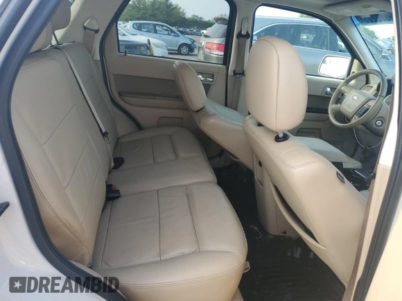 2010 Ford Escape Limited z VIN 1FMCU0EG4AKB30517, wystawiony jako Copart lot #59870285 z przebiegiem 126 483 mil mil oraz Czysty tytuł • Clean title. Historia ofert i sprzedaży dostępna na DreamBid. Obrazek 11.