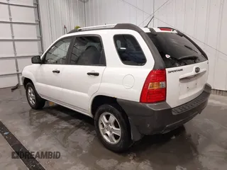 2007 Kia Sportage LX with VIN KNDJF724877399530, listed as a IAAI auction lot 41696698 with 124,967 mi miles. Bid and sale history available at carsss.com. Image 3.