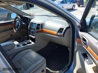 2011 Jeep Grand Cherokee Overland with VIN 1J4RR6GT6BC568491, listed as a IAAI auction lot 42035464 with 147,389 mi miles. Bid and sale history available at carsss.com. Image 5.