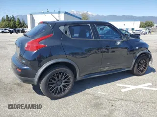 2014 Nissan Juke S with VIN JN8AF5MR9ET355316, listed as a Copart auction lot 49476035 with 143,806 mi miles and Salvage Title. Bid and sale history available at DreamBid. Image 3.