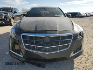 2014 Cadillac CTS Premium AWD с VIN 1G6AZ5S35E0159783, выставлен на аукционе Copart как лот 87081994 с пробегом 116 972 миль миль и Списание • Salvage title. История ставок и продаж доступна на DreamBid. Изображение 5.