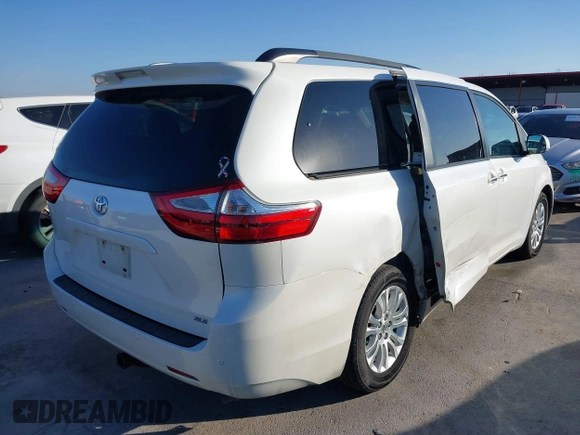 2016 Toyota Sienna XLE with VIN 5TDYK3DC6GS758189, listed as a IAAI auction lot 41598251 with 129,050 mi miles and . Bid and sale history available at DreamBid. Image 4.