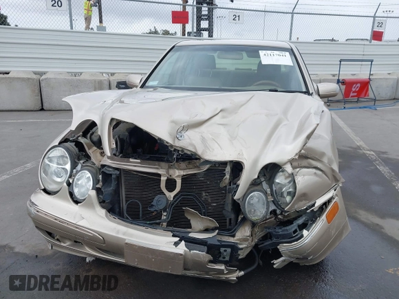 2001 Mercedes-Benz E 320 z VIN WDBJF65J71B245423, wystawiony jako IAAI lot #42117041 z przebiegiem 143 885 mil mil oraz . Historia ofert i sprzedaży dostępna na DreamBid. Obrazek 6.