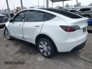 2022 Tesla Model Y Long Range with VIN 7SAYGDEE3NF518061, listed as a IAAI auction lot 41896233 with 34,714 mi miles and . Bid and sale history available at carsss.com. Image 3.