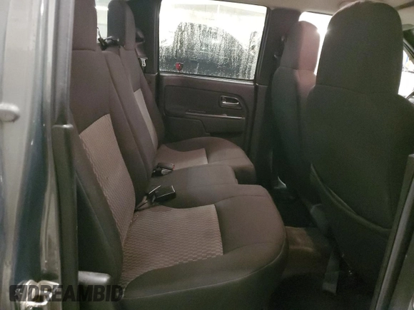 2010 GMC Canyon SLE1 with VIN 1GTJTCDE5A8148716, listed as a Copart auction lot 57559215 with 126,523 mi miles and Salvage title. Bid and sale history available at DreamBid. Image 10.