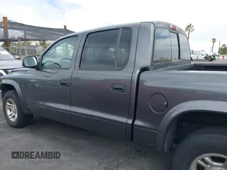 2003 Dodge Dakota SLT with VIN 1D7HL48N93S190381, listed as a IAAI auction lot 41921335 with 75,088 mi miles. Bid and sale history available at carsss.com. Image 6.
