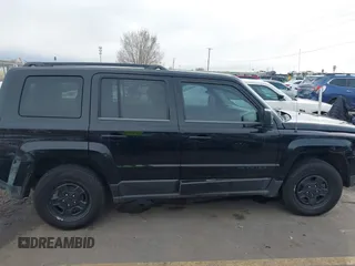 2013 Jeep Patriot Sport with VIN 1C4NJPBA3DD237887, listed as a IAAI auction lot 41599995 with 144,673 mi miles and . Bid and sale history available at DreamBid. Image 13.