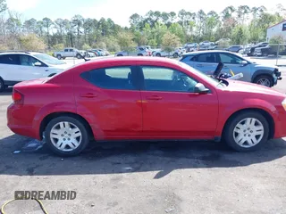 2013 Dodge Avenger SE with VIN 1C3CDZABXDN529054, listed as a IAAI auction lot 41881632 with 179,519 mi miles and . Bid and sale history available at DreamBid. Image 13.