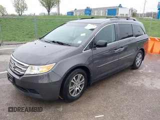 2012 Honda Odyssey EX-L with VIN 5FNRL5H6XCB032366, listed as a IAAI auction lot 41943625 with 73,236 mi miles and . Bid and sale history available at carsss.com. Image 2.