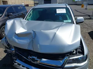 2015 Chevrolet Colorado 4WD LT with VIN 1GCGTBE36F1125107, listed as a IAAI auction lot 39514133 with 105,116 mi miles. Bid and sale history available at carsss.com. Image 10.