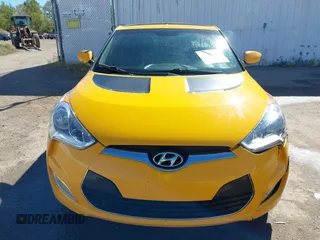 2013 Hyundai Veloster w/Gray Int with VIN KMHTC6AD8DU093272, listed as a IAAI auction lot 40407768 with 91,038 mi miles and . Bid and sale history available at DreamBid. Image 6.