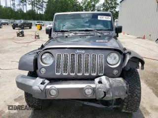 2016 Jeep Wrangler Unlimited Sahara с VIN 1C4BJWEG5GL221827, выставлен на аукционе Copart как лот 60411625 с пробегом 65 405 миль миль и Списание • Salvage title. История ставок и продаж доступна на DreamBid. Изображение 5.