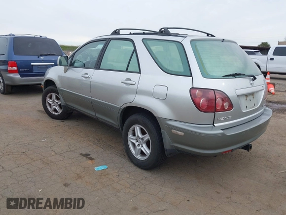 1999 Lexus RX 300 Luxury SUV with VIN JT6HF10U5X0017629, listed as a IAAI auction lot 41569806 with 174,068 mi miles. Bid and sale history available at carsss.com. Image 3.