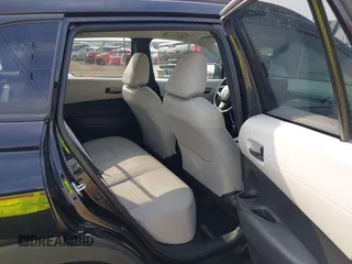 2023 Toyota Corolla Cross LE with VIN 7MUCAAAG3PV067507, listed as a IAAI auction lot 42177142 with 124,772 mi miles and . Bid and sale history available at DreamBid. Image 8.