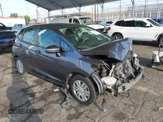 2015 Honda Fit LX with VIN 3HGGK5H58FM713533, listed as a IAAI auction lot 40473868 with Not provided miles and . Bid and sale history available at DreamBid. Image 1.