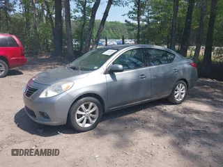 2014 Nissan Versa SV with VIN 3N1CN7AP2EL851670, listed as a IAAI auction lot 42167654 with 112,277 mi miles. Bid and sale history available at carsss.com. Image 2.