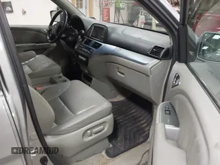 2009 Honda Odyssey EX-L with VIN 5FNRL38789B015524, listed as a IAAI auction lot 42135465 with 242,005 mi miles. Bid and sale history available at carsss.com. Image 5.