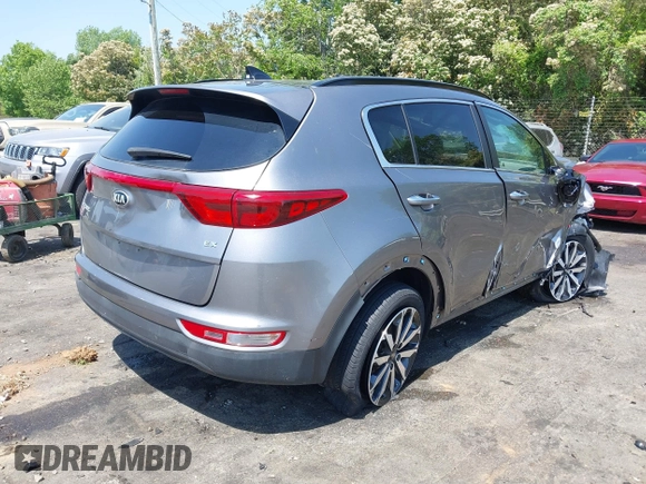 2018 Kia Sportage EX z VIN KNDPNCAC6J7401698, wystawiony jako IAAI lot #42071433 z przebiegiem 88 782 mil mil oraz . Historia ofert i sprzedaży dostępna na DreamBid. Obrazek 4.