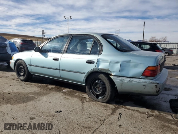 1994 Toyota Corolla Deluxe with VIN JT2AE09B4R0067104, listed as a Copart auction lot 83565064 with 207,923 mi miles and Salvage title. Bid and sale history available at DreamBid. Image 2.