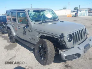 2022 Jeep Wrangler Unlimited Sahara with VIN 1C4HJXENXNW138856, listed as a IAAI auction lot 41670191 with 56,231 mi miles and . Bid and sale history available at DreamBid. Image 1.