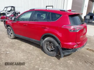 2016 Toyota RAV4 LE with VIN 2T3BFREV7GW517043, listed as a IAAI auction lot 41828999 with 103,587 mi miles. Bid and sale history available at carsss.com. Image 3.