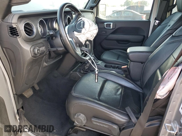 2019 Jeep Wrangler Unlimited Sahara with VIN 1C4HJXEN0KW616942, listed as a Copart auction lot 63501755 with 57,095 mi miles and Salvage title. Bid and sale history available at DreamBid. Image 7.