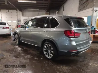 2018 BMW X5 xDrive35i with VIN 5UXKR0C53J0Y03214, listed as a IAAI auction lot 41509082 with 92,552 mi miles. Bid and sale history available at carsss.com. Image 3.