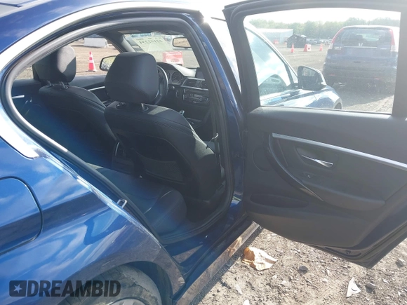 2017 BMW 3 Series 330i xDrive with VIN WBA8D9C32HA005561, listed as a IAAI auction lot 42161234 with Not provided miles and . Bid and sale history available at DreamBid. Image 8.