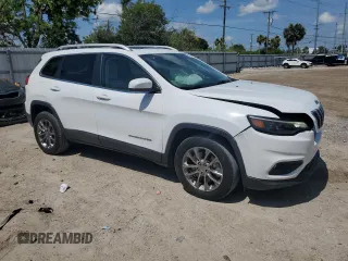 2020 Jeep Cherokee Lux with VIN 1C4PJLLX4LD517207, listed as a Copart auction lot 59304434 with 56,952 mi miles and Non repairable. Bid and sale history available at DreamBid. Image 4.