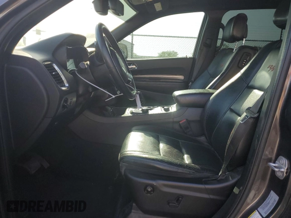 2016 Dodge Durango R/T with VIN 1C4SDJCT5GC371916, listed as a Copart auction lot 59390725 with 133,863 mi miles and Salvage title. Bid and sale history available at DreamBid. Image 7.