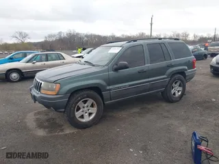 2002 Jeep Grand Cherokee Laredo with VIN 1J4GW48NX2C151430, listed as a IAAI auction lot 41886769 with 222,795 mi miles. Bid and sale history available at carsss.com. Image 2.