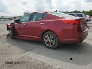 2013 Kia Optima EX z VIN 5XXGN4A7XDG169353, wystawiony jako Copart lot #55784855 z przebiegiem 92 809 mil mil oraz Szkoda całkowita • Salvage title. Historia ofert i sprzedaży dostępna na DreamBid. Obrazek 2.