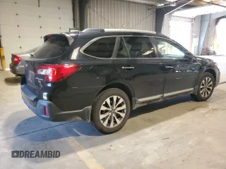 2018 Subaru Outback Touring with VIN 4S4BSETC5J3359796, listed as a Copart auction lot 65845795 with 106,992 mi miles and Salvage title. Bid and sale history available at DreamBid. Image 3.