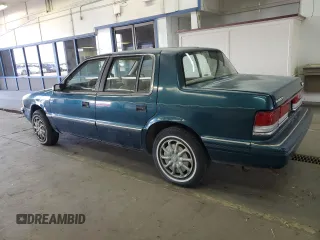 1994 Plymouth Acclaim z VIN 3P3AA46K7RT276936, wystawiony jako Copart lot #49509835 z przebiegiem 176 324 mil mil oraz Tytuł czysty. Historia ofert i sprzedaży dostępna na DreamBid. Obrazek 2.