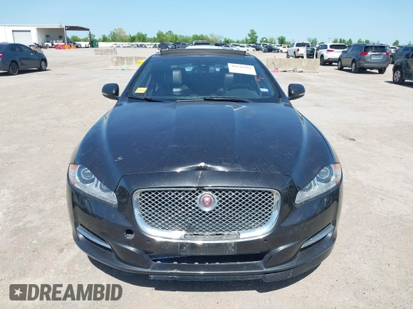 2015 Jaguar XJ R-Sport with VIN SAJWJ1CD6F8V83990, listed as a IAAI auction lot 41936162 with Not Provided miles and . Bid and sale history available at DreamBid. Image 12.