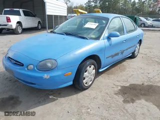 1999 Ford Taurus SE with VIN 1FAFP53U2XA154351, listed as a IAAI auction lot 41943794 with 125,085 mi miles. Bid and sale history available at carsss.com. Image 2.
