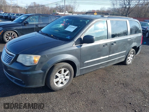 2012 Chrysler Town & Country Touring with VIN 2C4RC1BG8CR213738, listed as a IAAI auction lot 41912682 with 211,470 mi miles and . Bid and sale history available at DreamBid. Image 2.