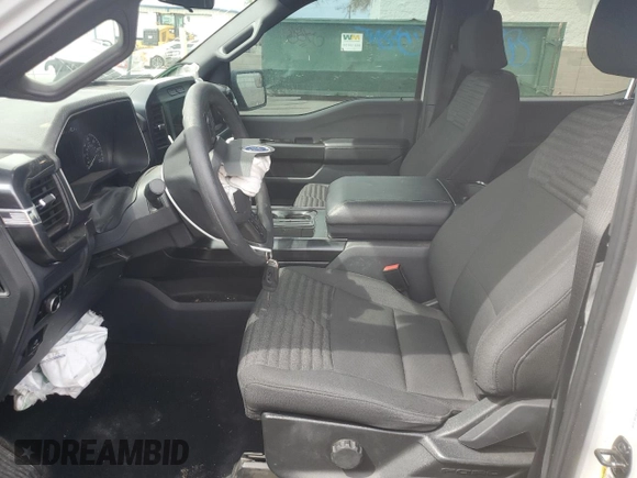 2023 Ford F-150 XL with VIN 1FTEW1CP2PFC13963, listed as a Copart auction lot 56045545 with 26,619 mi miles and Salvage title. Bid and sale history available at DreamBid. Image 7.