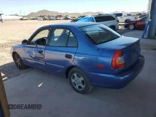 2002 Hyundai Accent GL with VIN KMHCG45C32U332833, listed as a Copart auction lot 66539644 with 69,763 mi miles and Salvage Title. Bid and sale history available at carsss.com. Image 2.