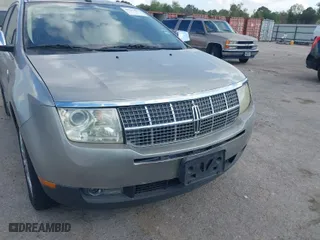 2008 Lincoln MKX with VIN 2LMDU68C48BJ26704, listed as a IAAI auction lot 40707057 with 171,794 mi miles. Bid and sale history available at carsss.com. Image 6.